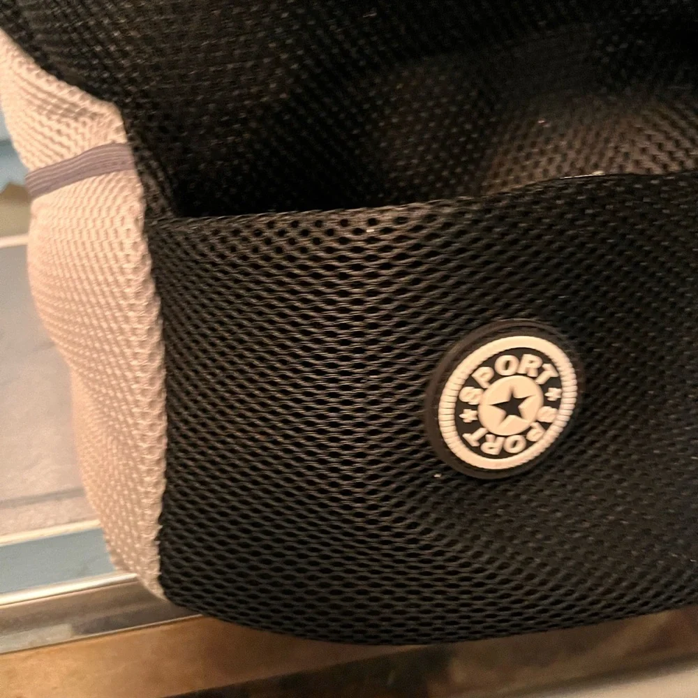 Portable new doggie backpack. Medium dog size. Oxford style. Pockets.Harness